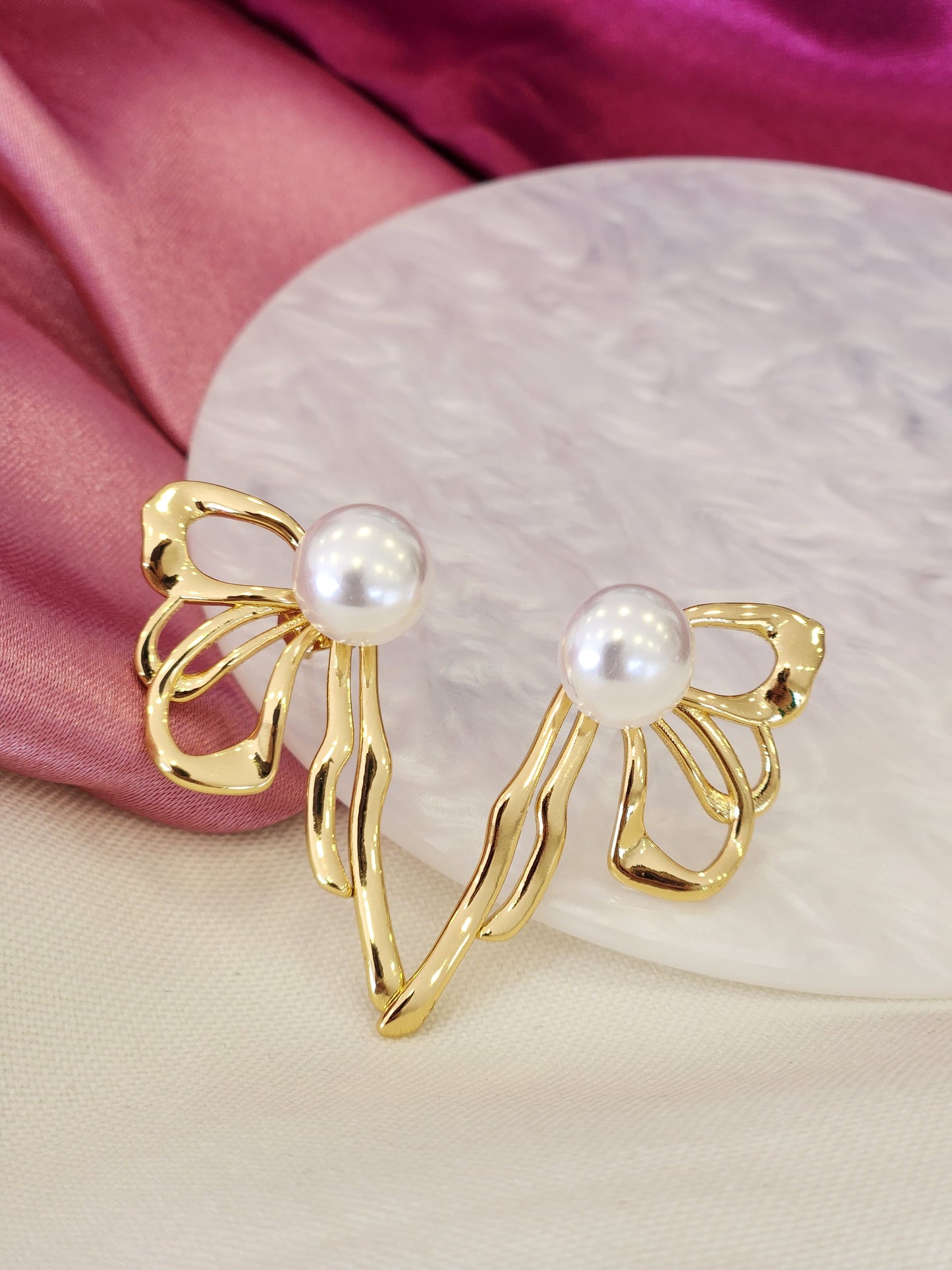 Aretes media mariposa perla