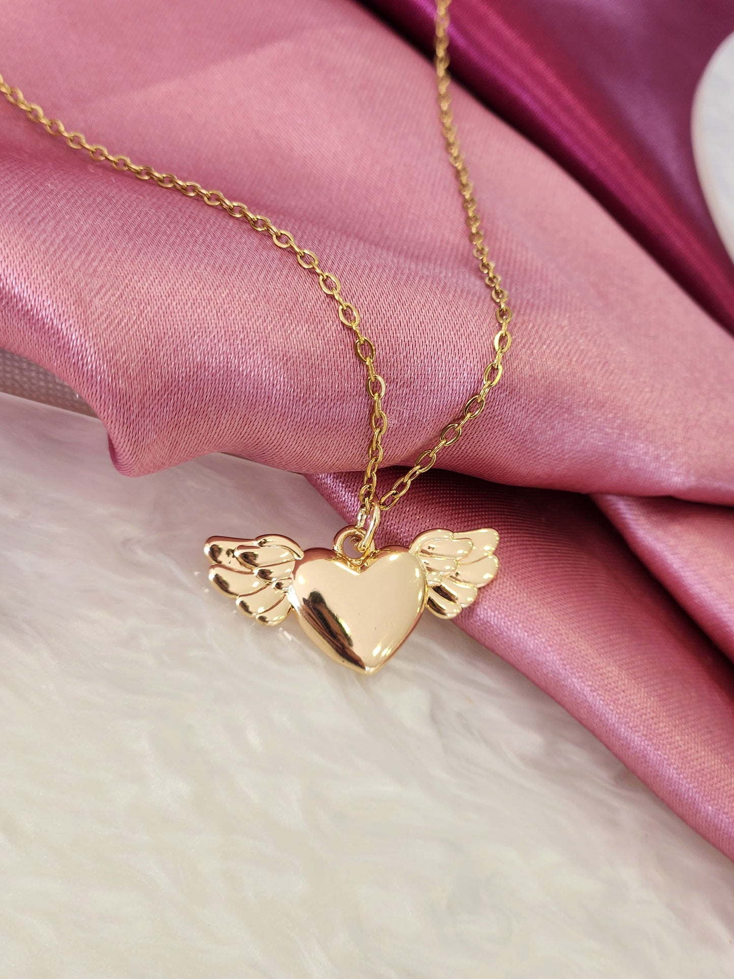 Collar corazon alas #GG