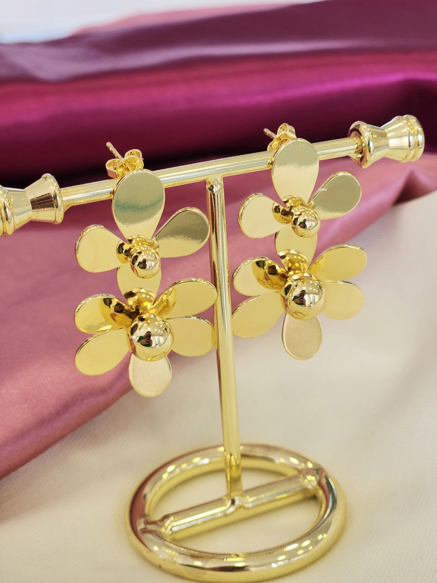 Aretes doble flor colgante