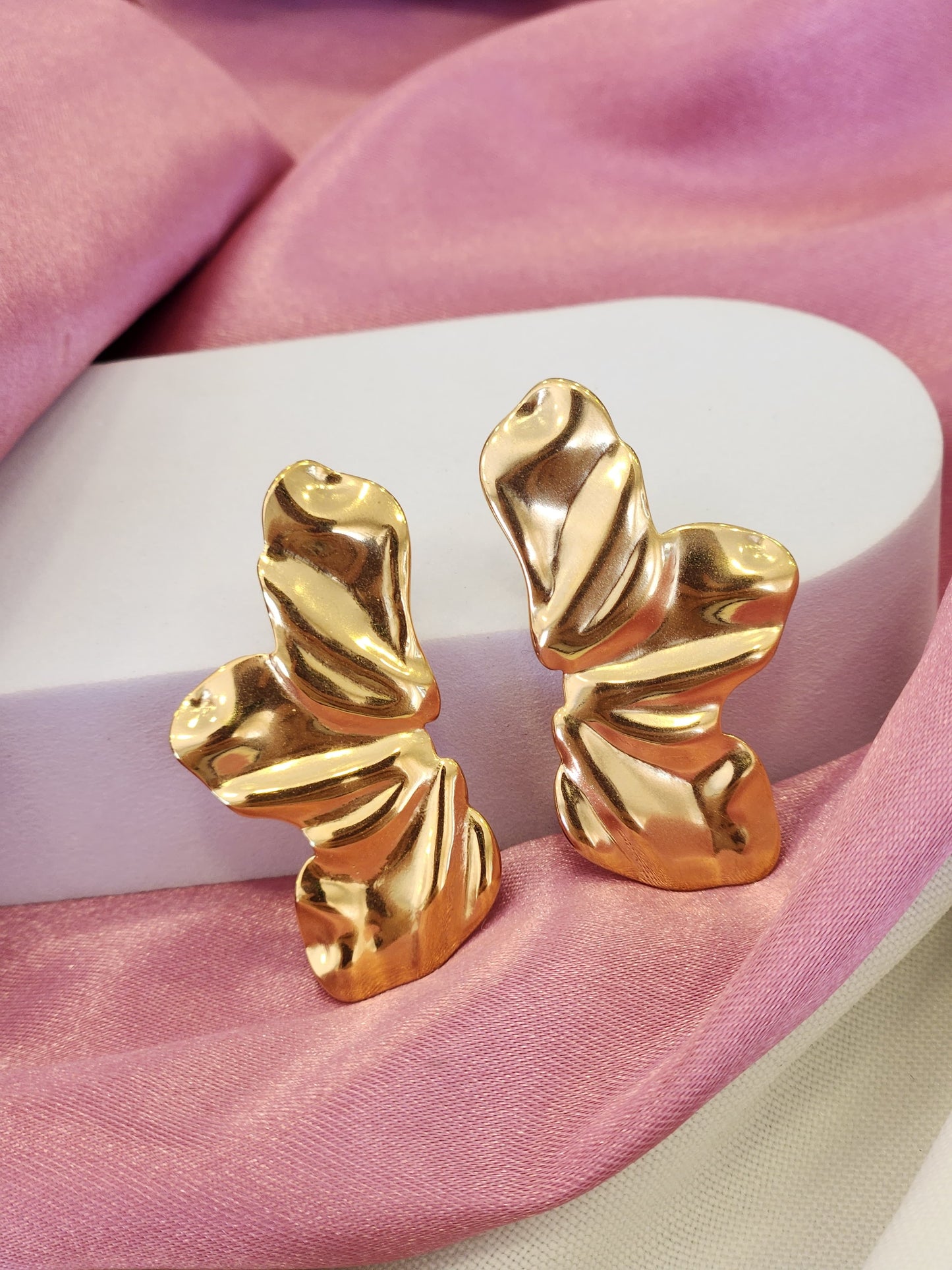 Aretes largos media flor #F16.2