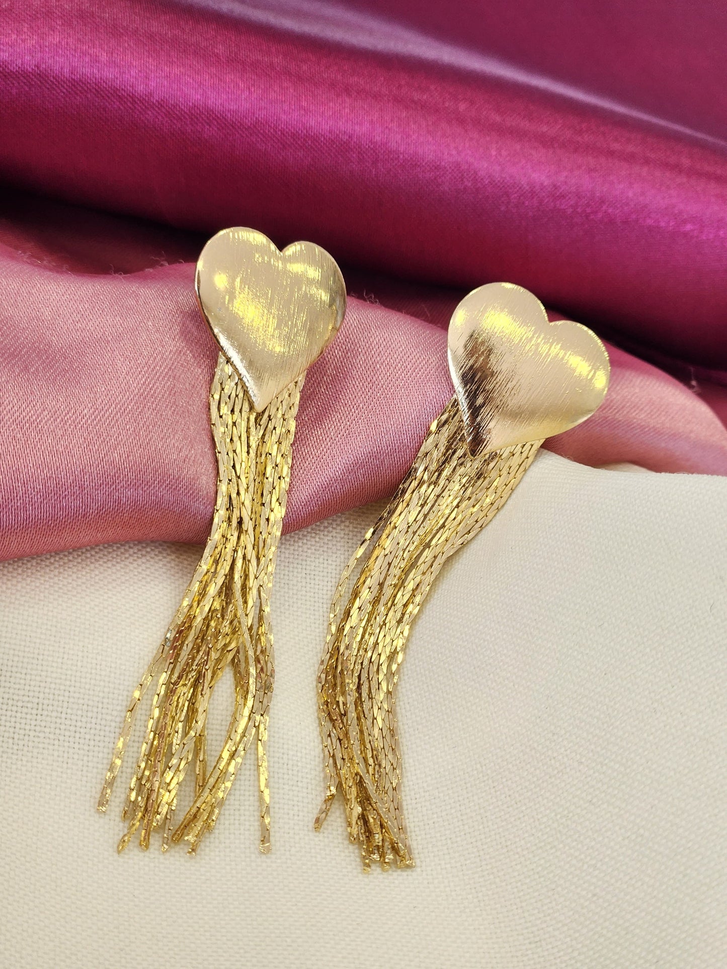 Aretes corazon tiras largas