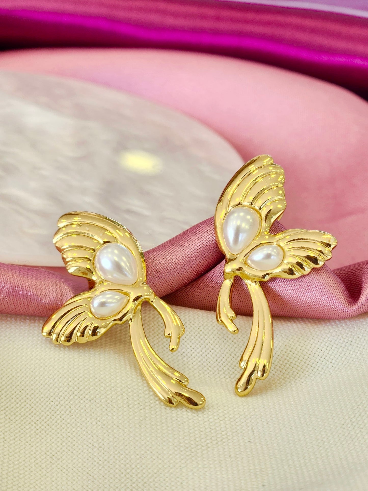 Aretes mariposa alas perlas
