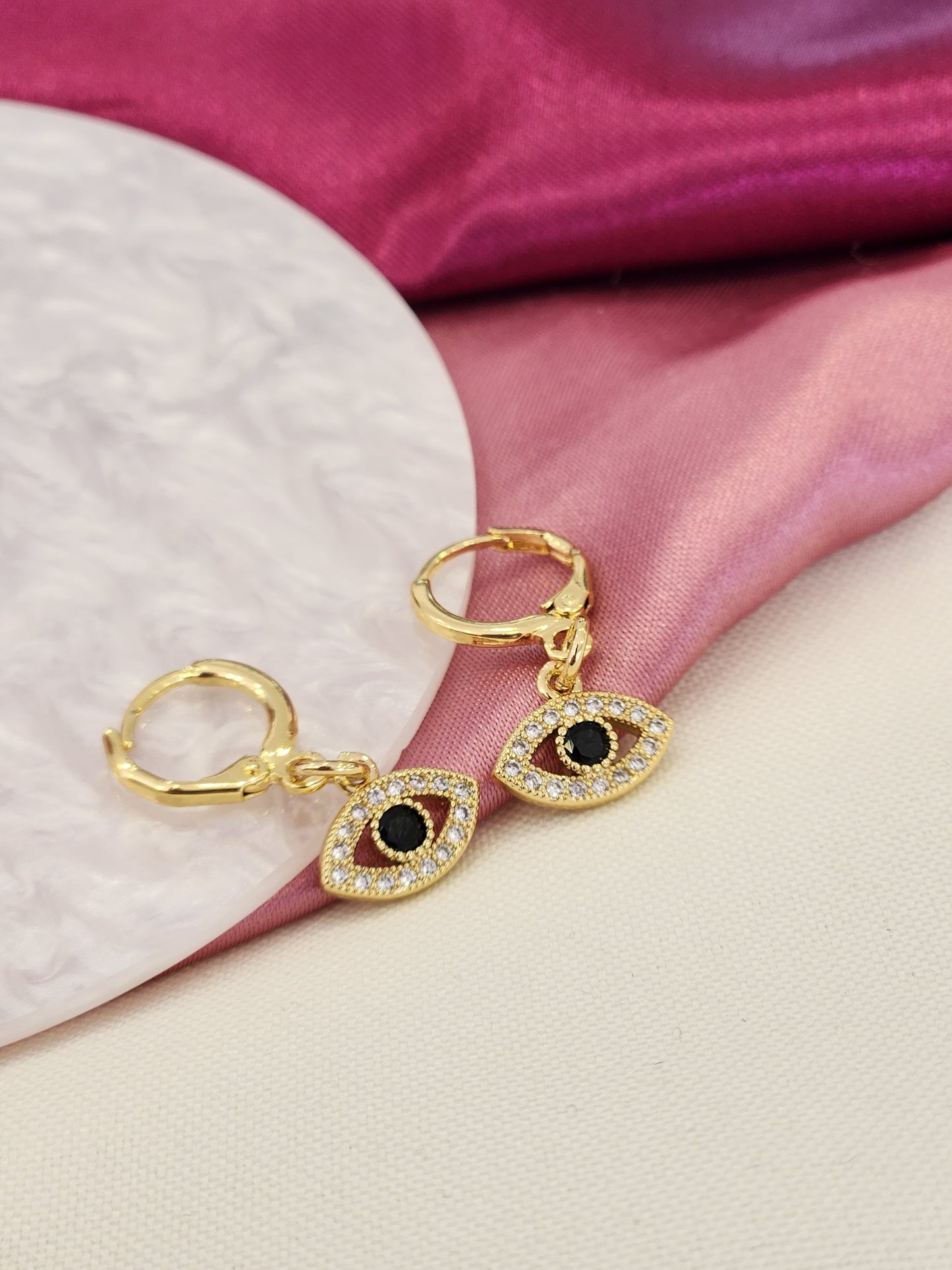 Aretes ojo zirconia negra