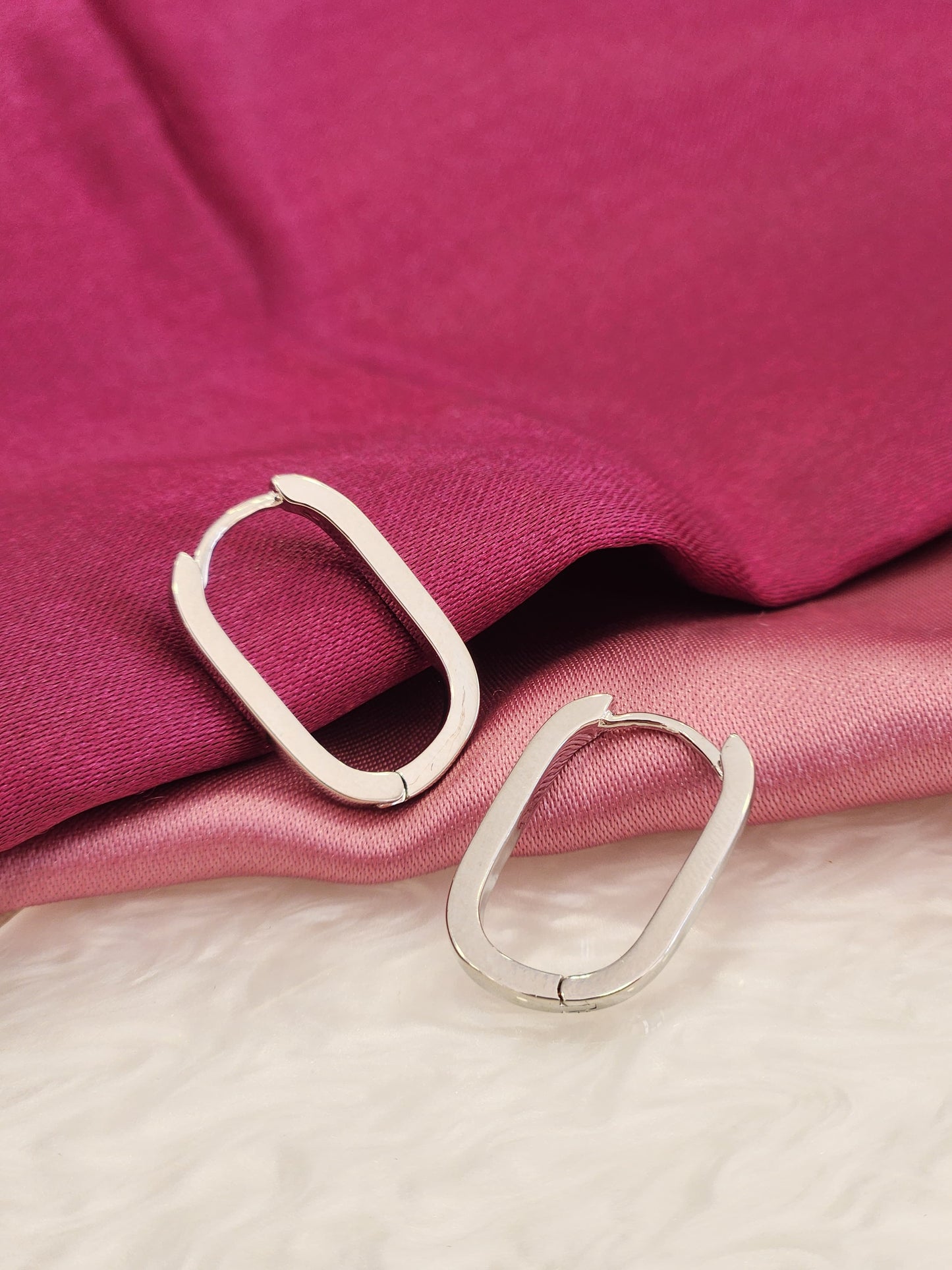 Aretes ovalados plateados lisos #K39