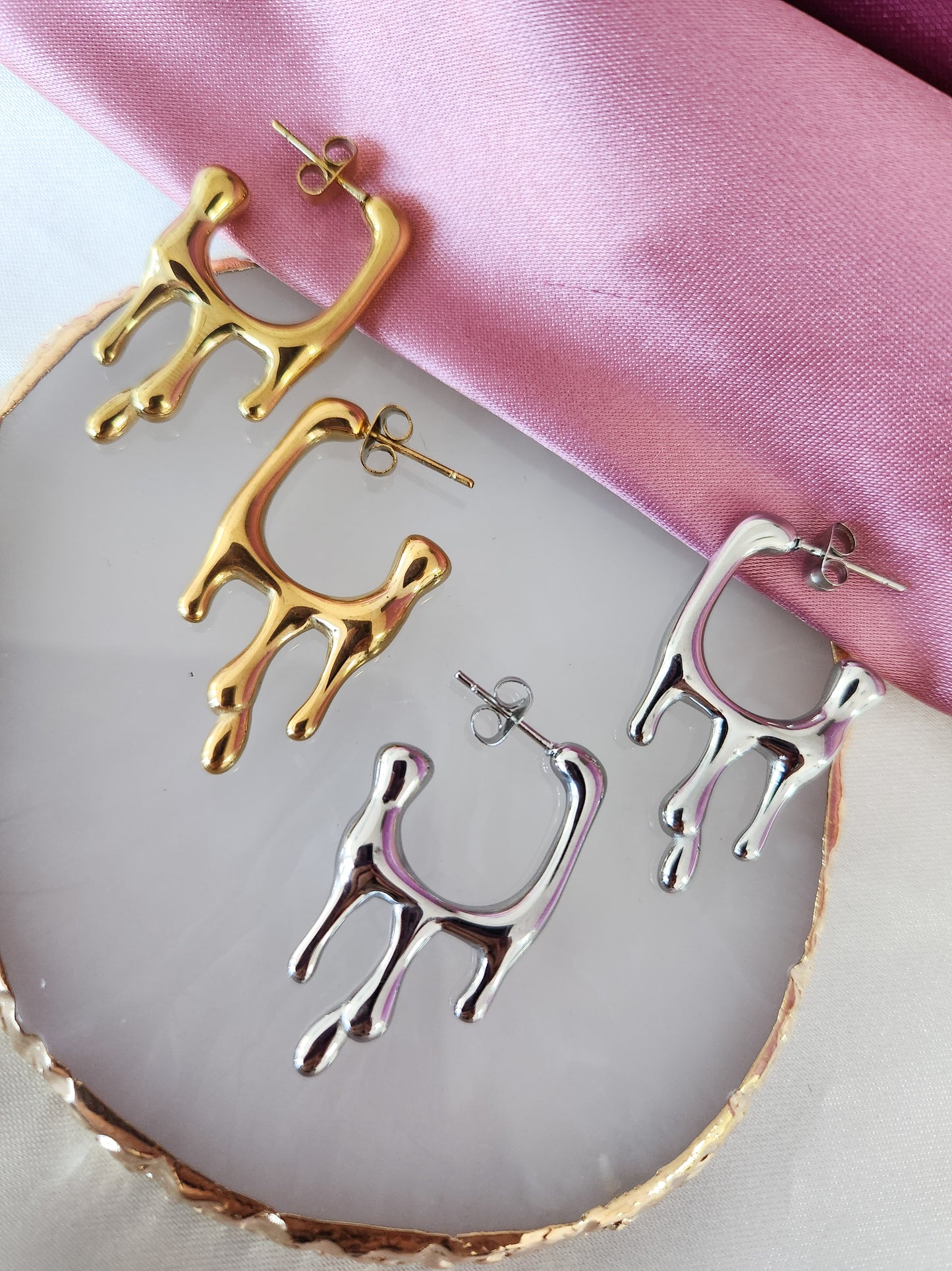 Aretes derretidos