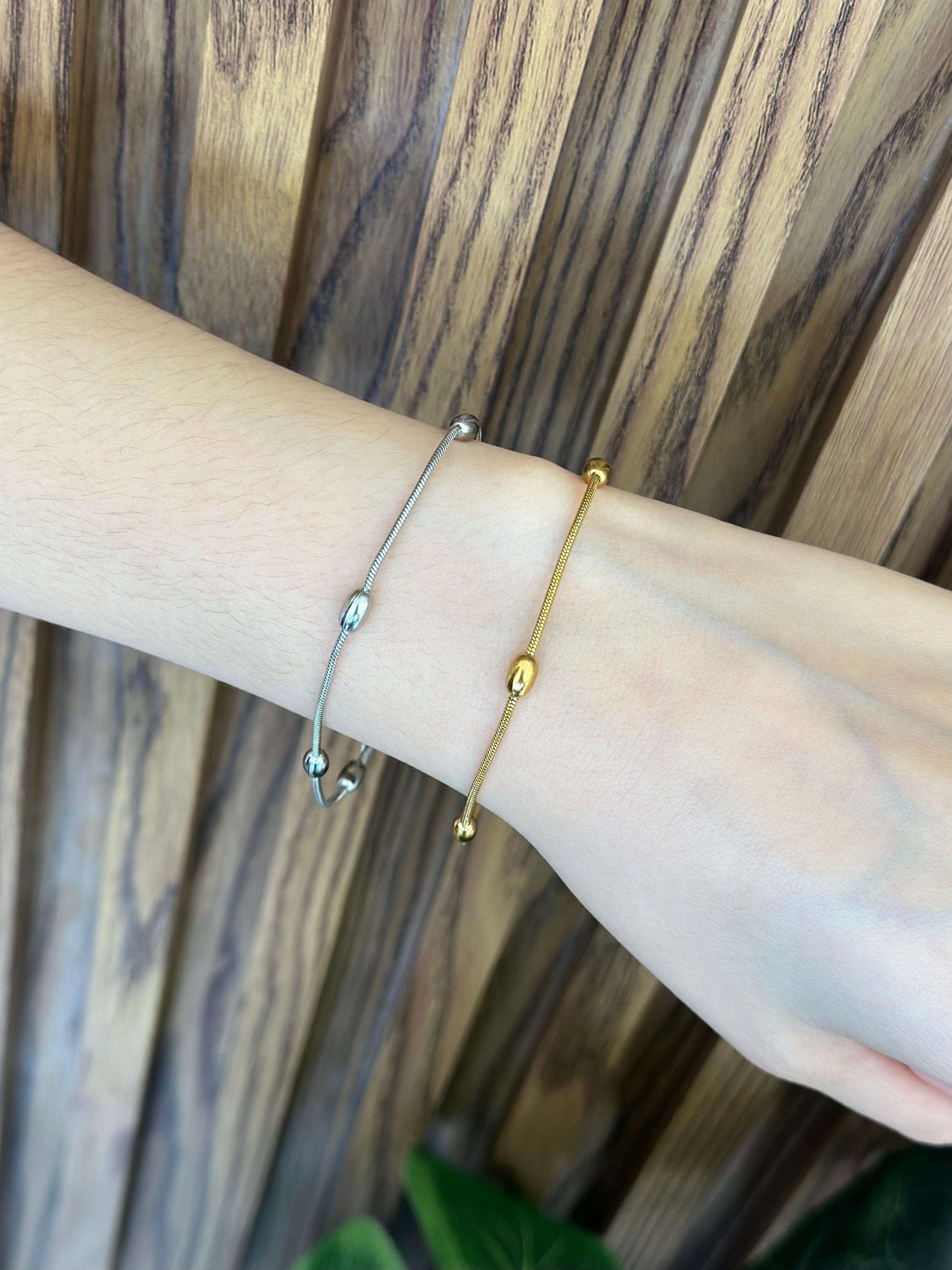 Pulsera bolitas alargadas