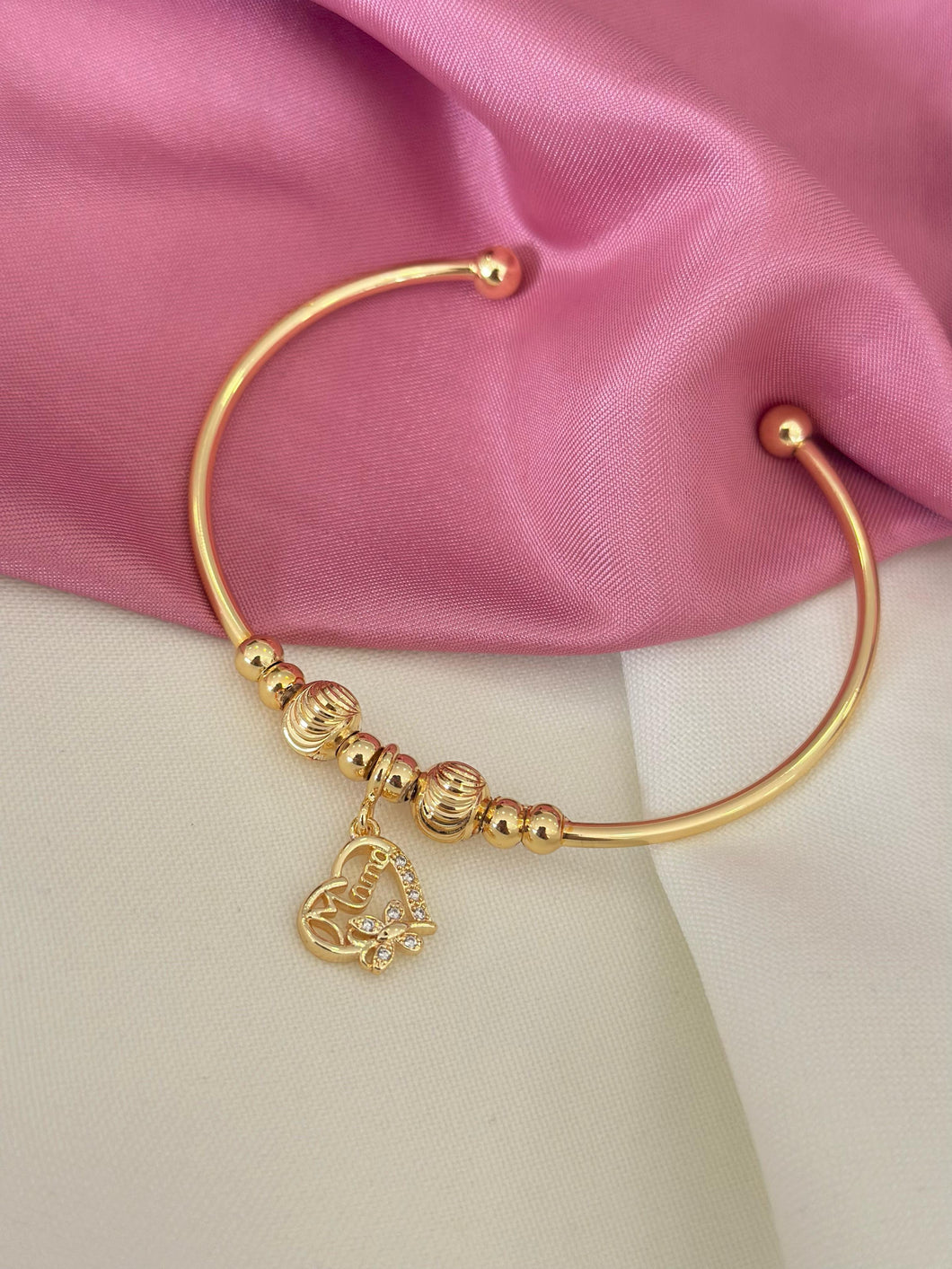 Pulsera dorada rígida mama #A15.2