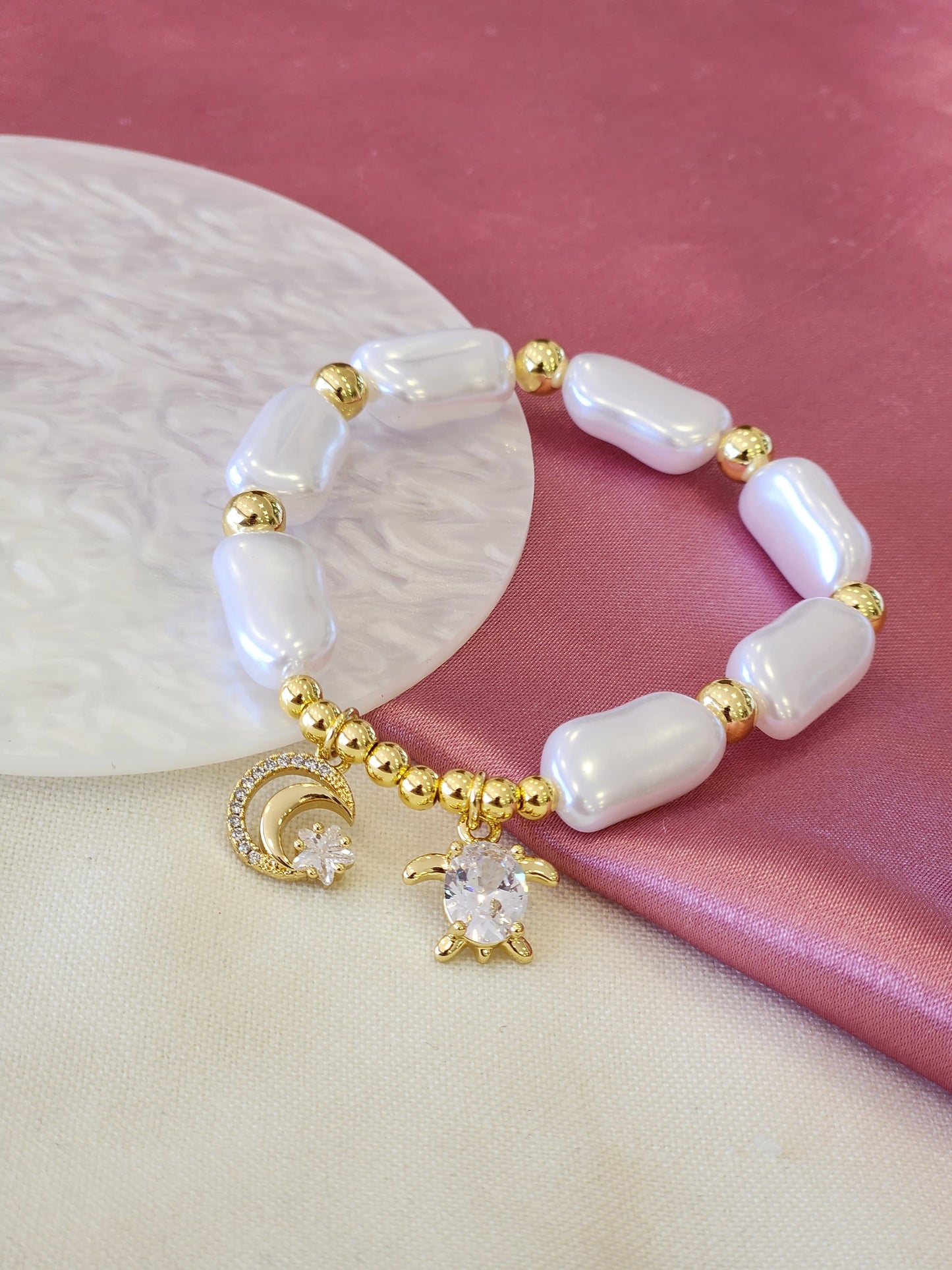 Pulsera perla alargada luna tortuga #F19