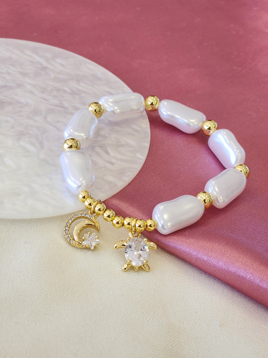 Pulsera perla alargada luna tortuga #F19