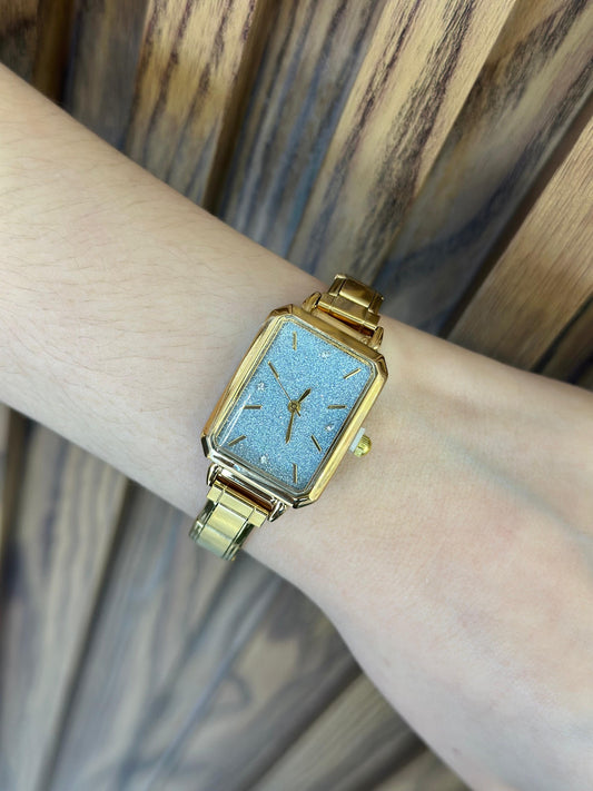 Reloj dorado rectangular azul brillos #F4