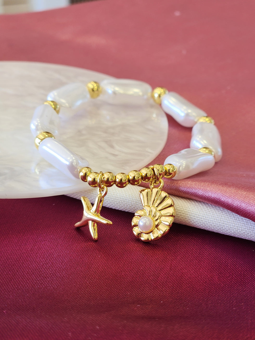 Pulsera perlas alargadas estrella concha #G20