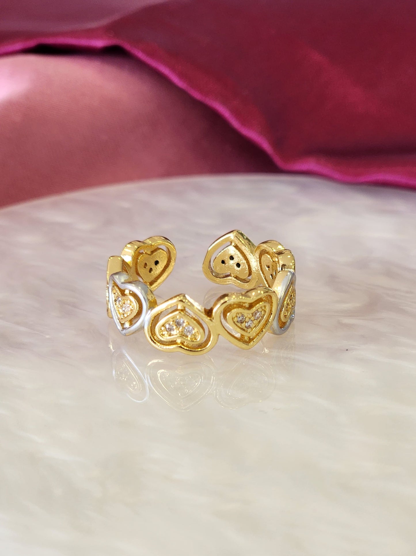 Anillo corazones intercalados bicolor zirconia #81