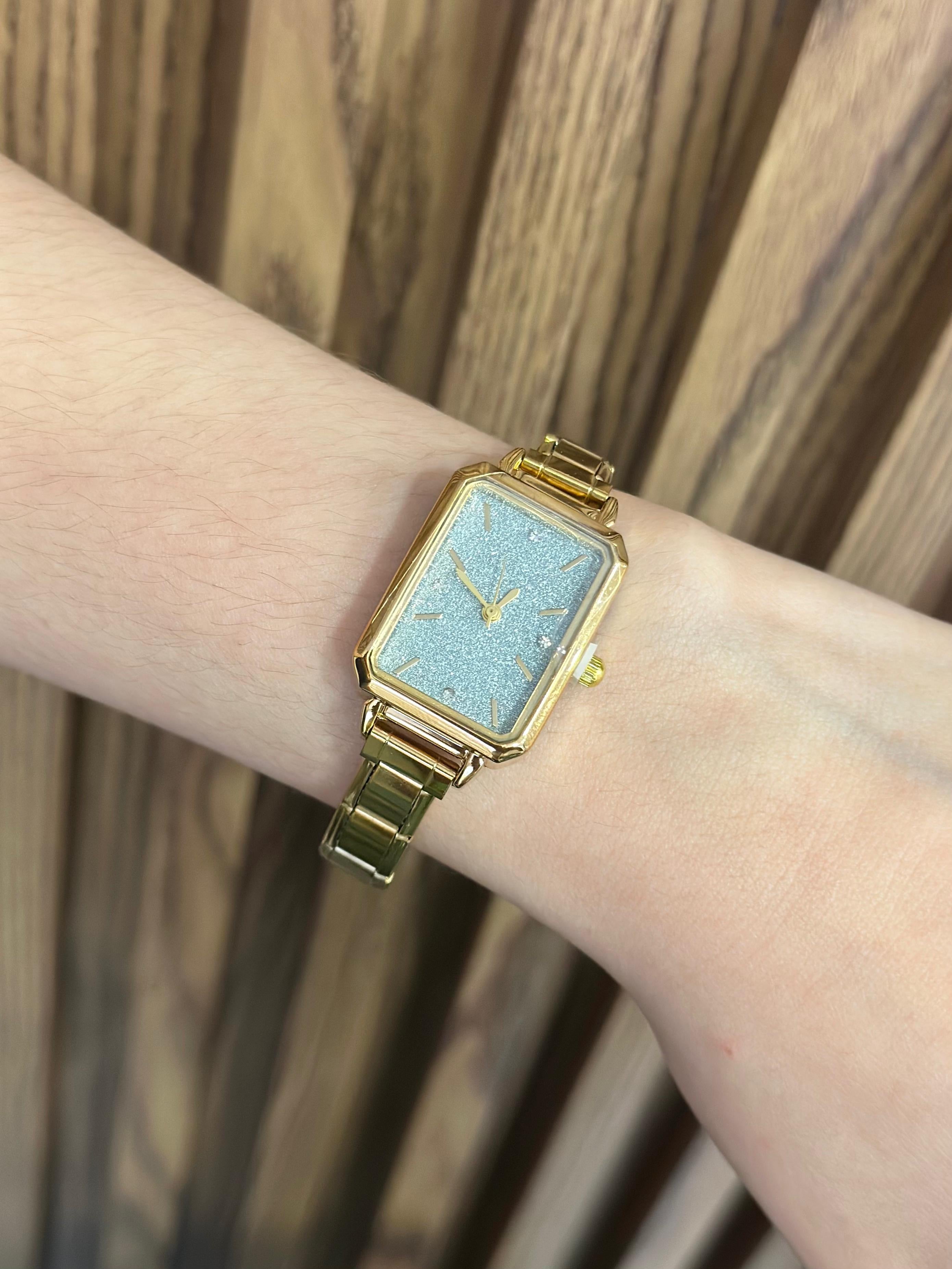 Reloj brillos verde