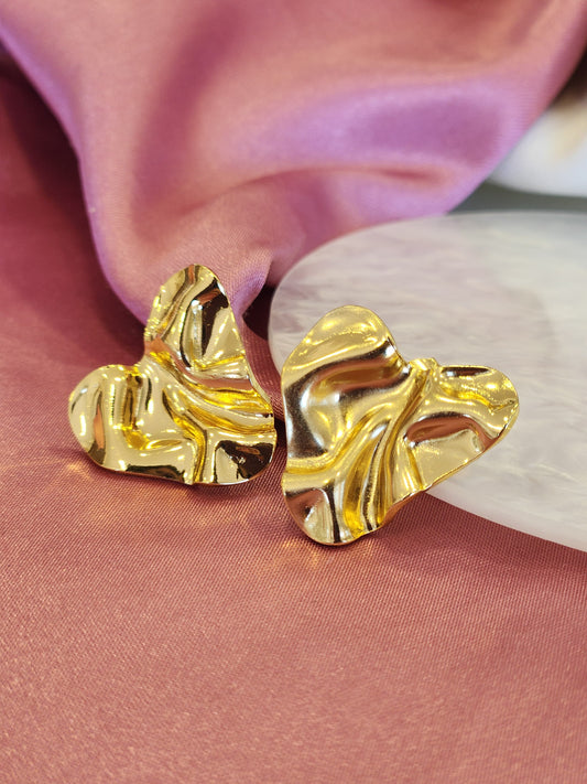 Aretes corazon con relieve #F49