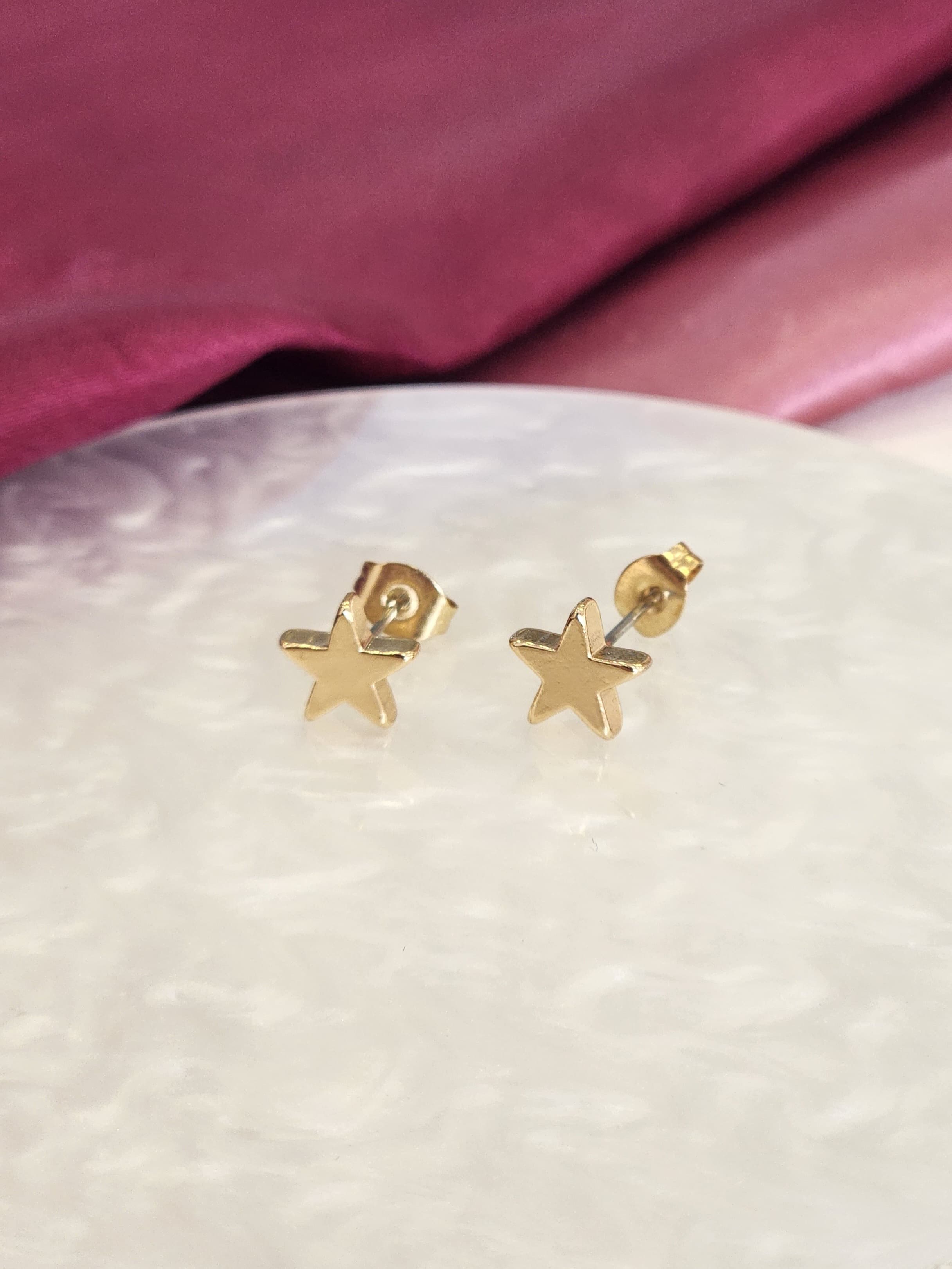 Aretes broquel estrella solida #G13