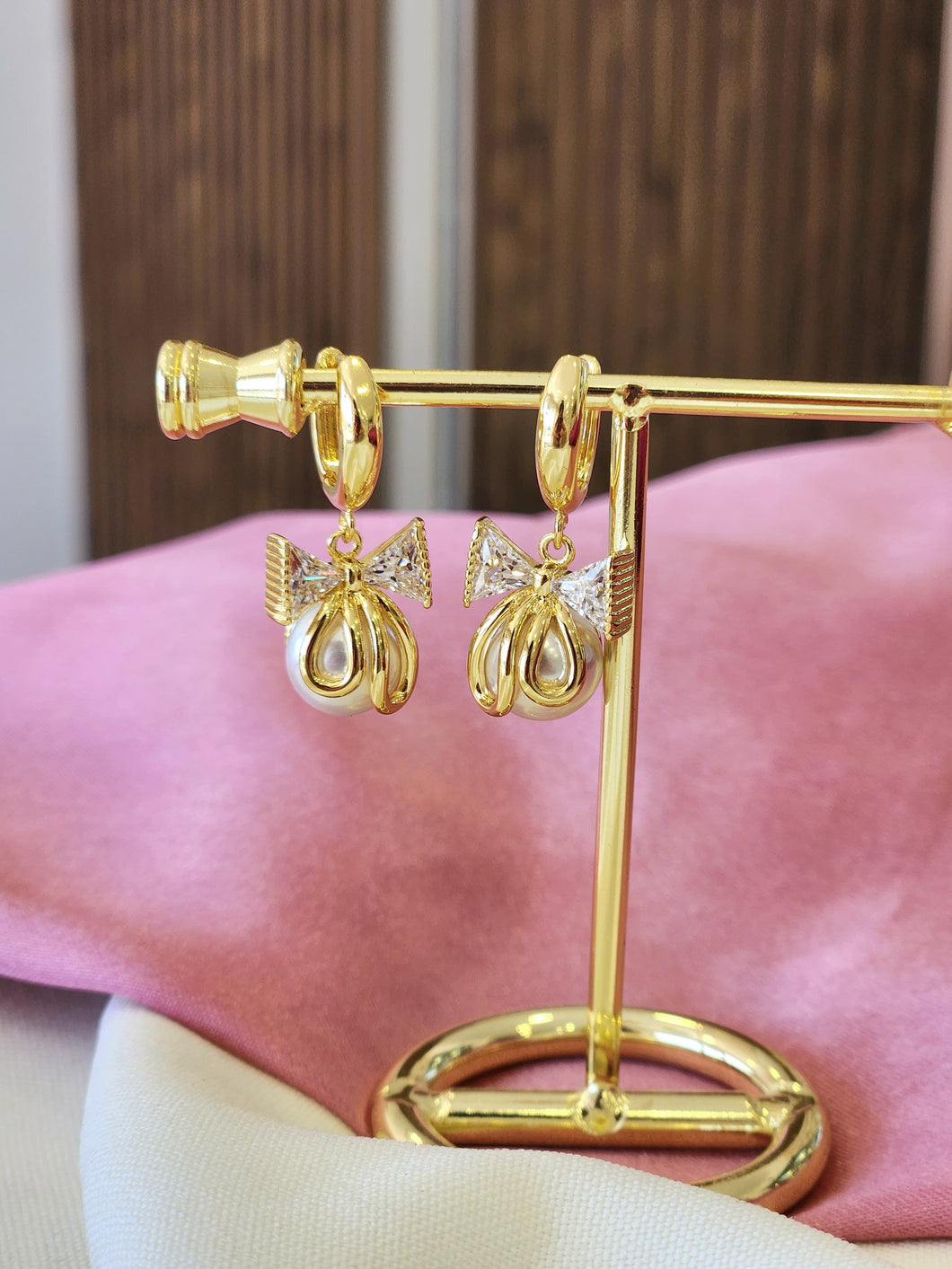 Arracadas moño zirconia con perla #E25