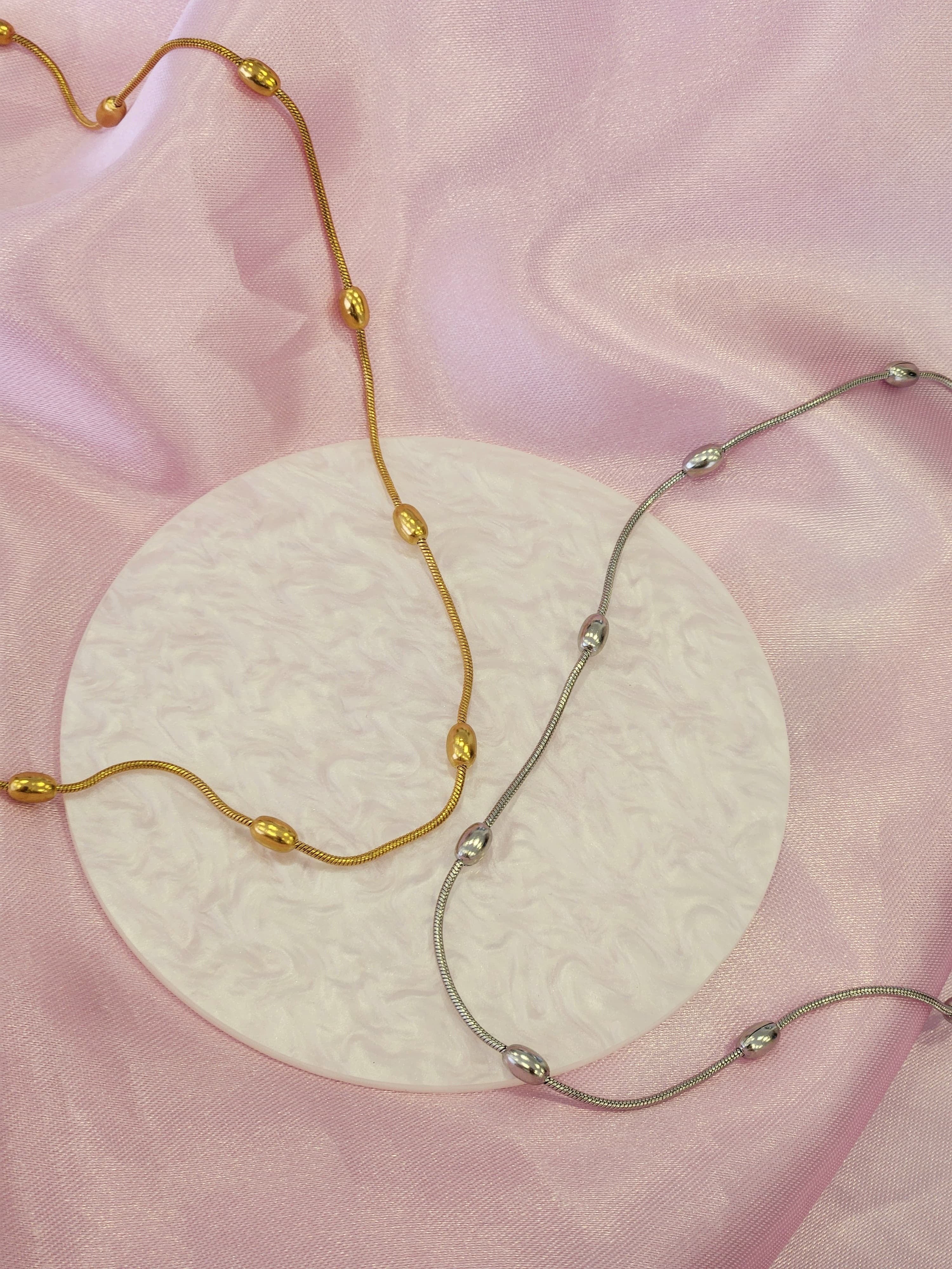 Collar bolitas alargadas #F3