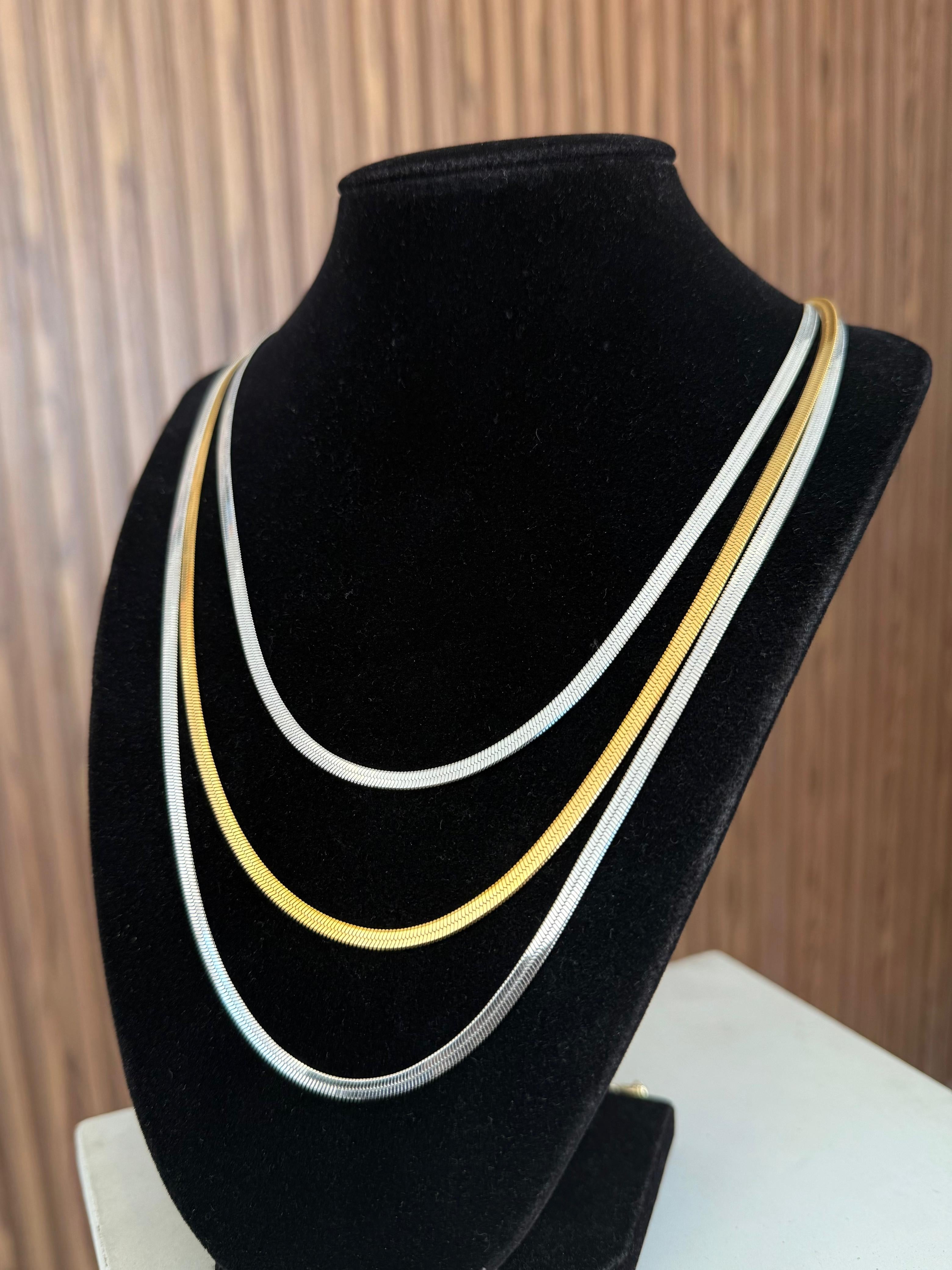 Collar triple plana bicolor