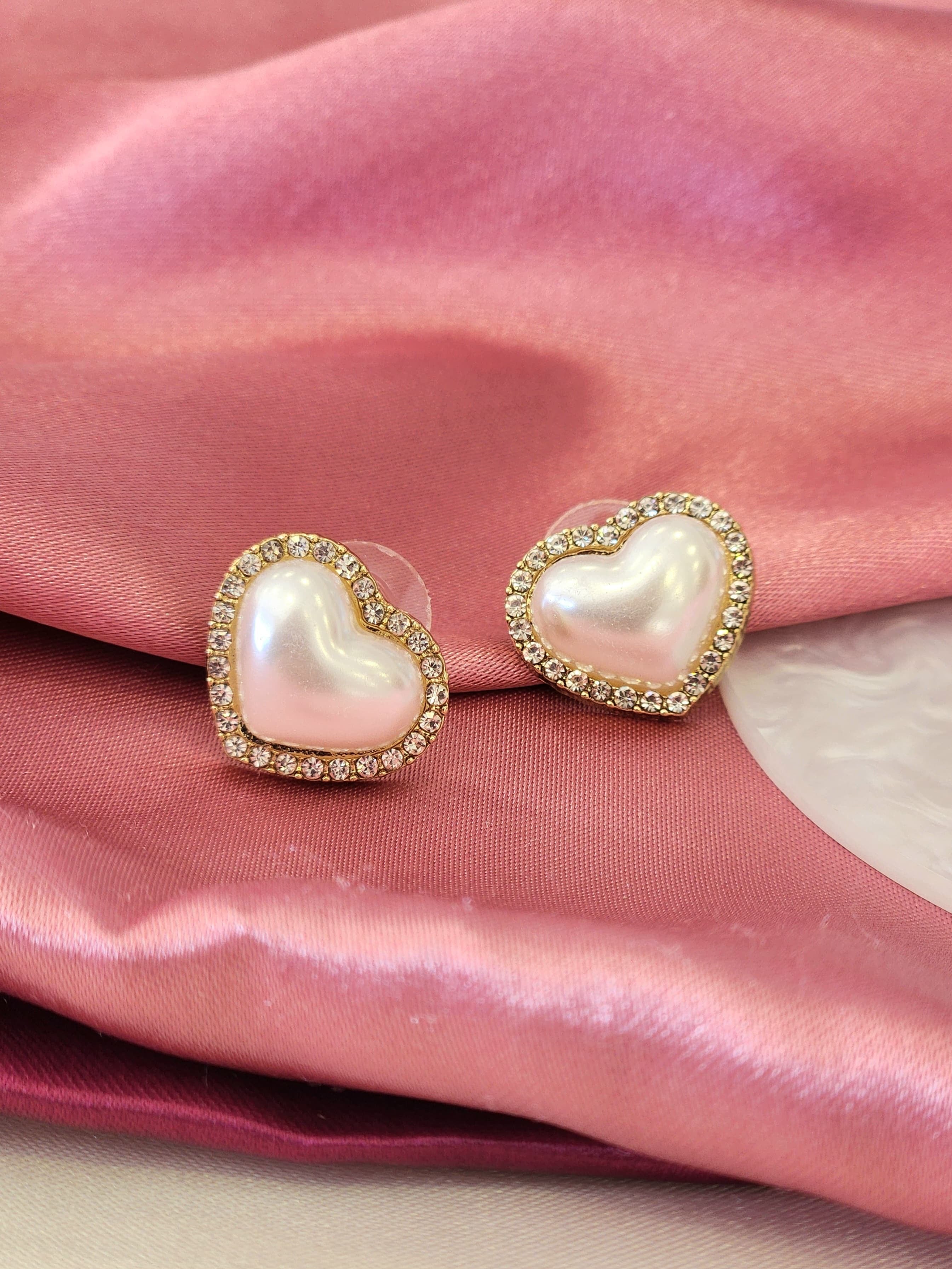 Aretes corazon perla zirconia alrededor