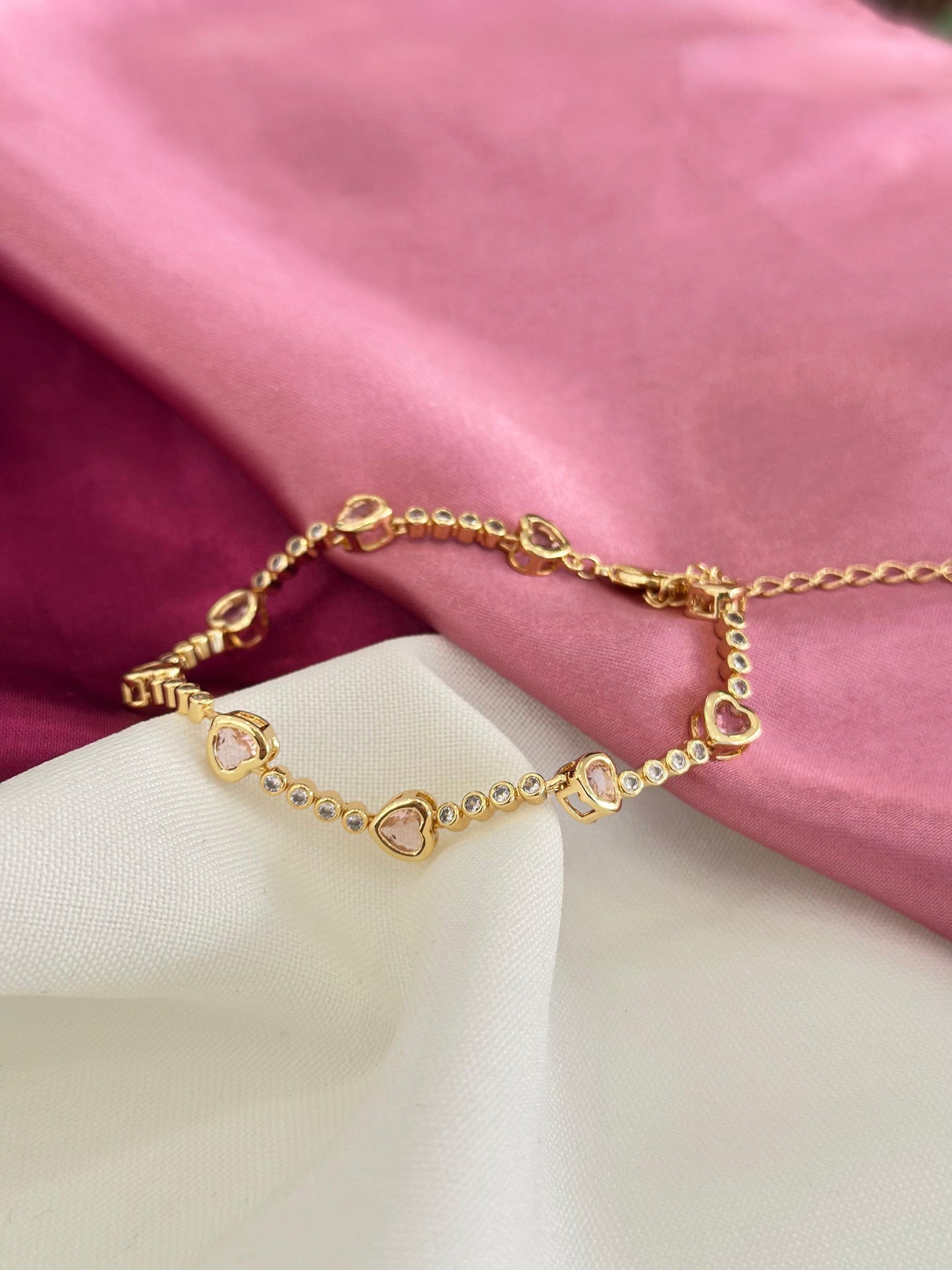 Pulsera corazones rosas consecutivos zirconia #K25
