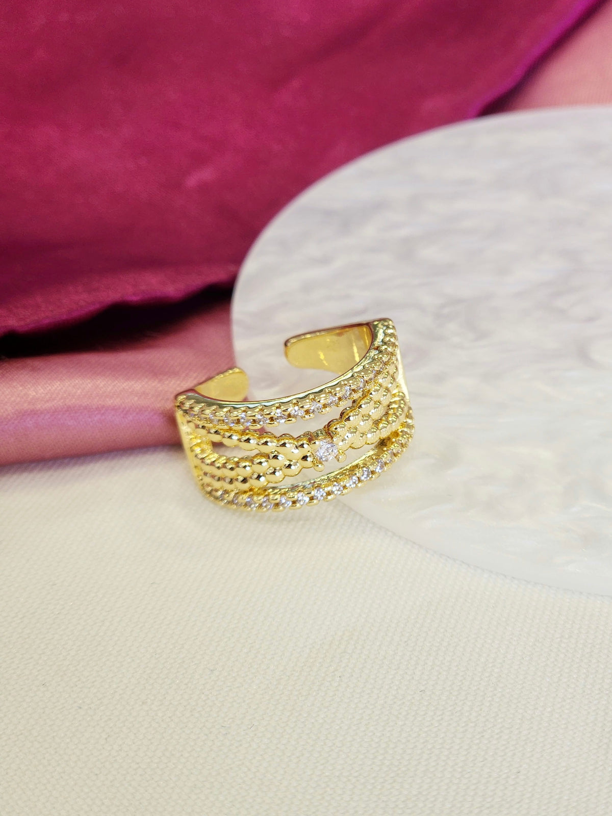 Anillo bolitas cruzadas zirconia #A8