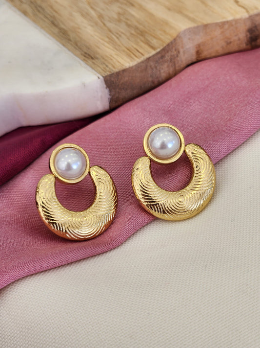 Aretes perla forma U textura #1.9