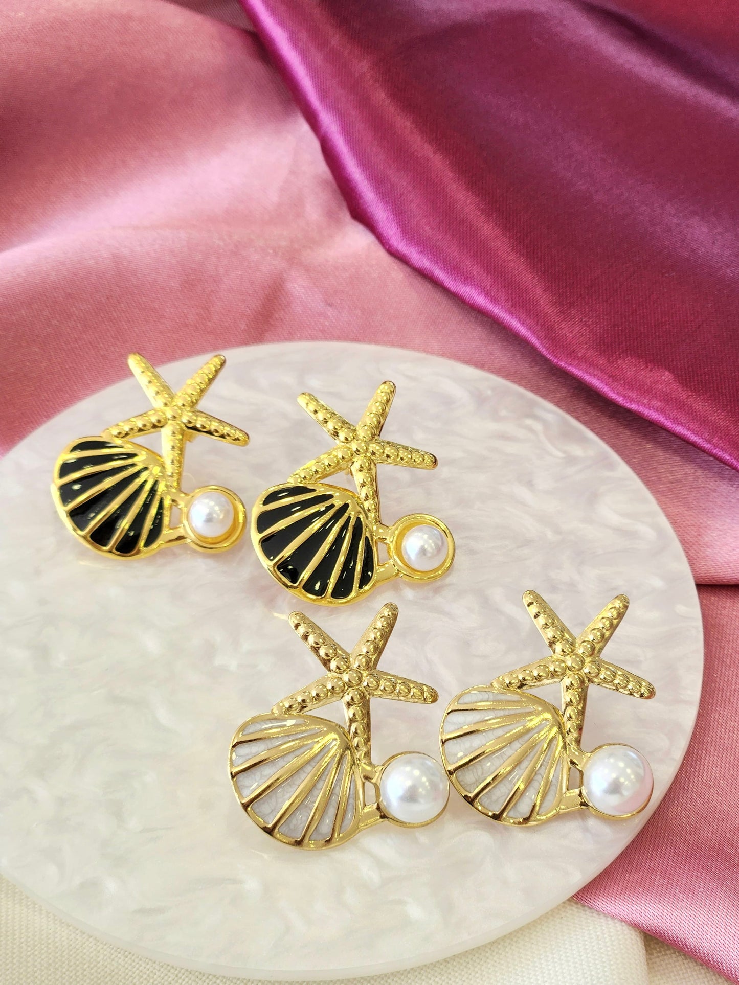 Aretes estrella de mar, concha negra y perla #J11
