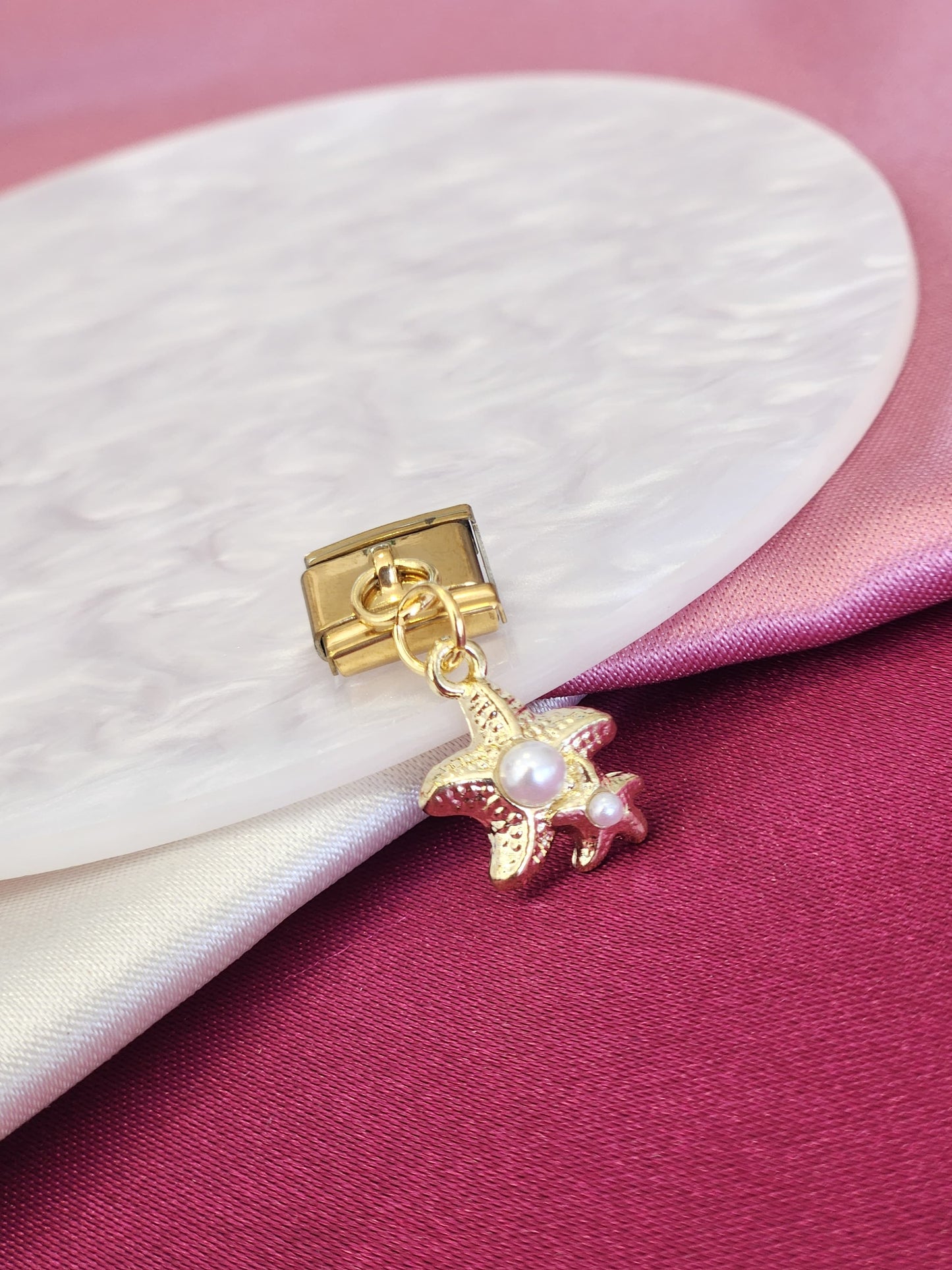 Charm doble estrellas de mar con perla #15
