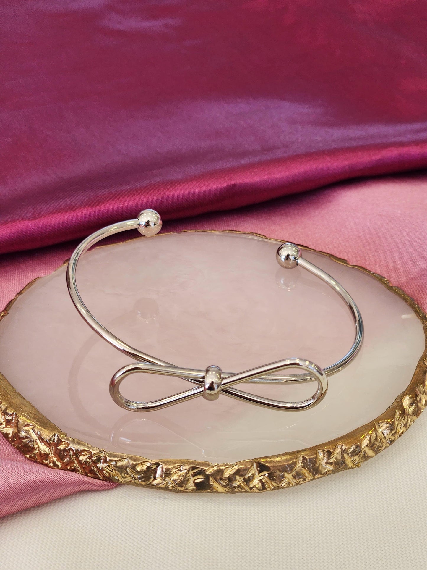 Pulsera y anillo moño plateado #42