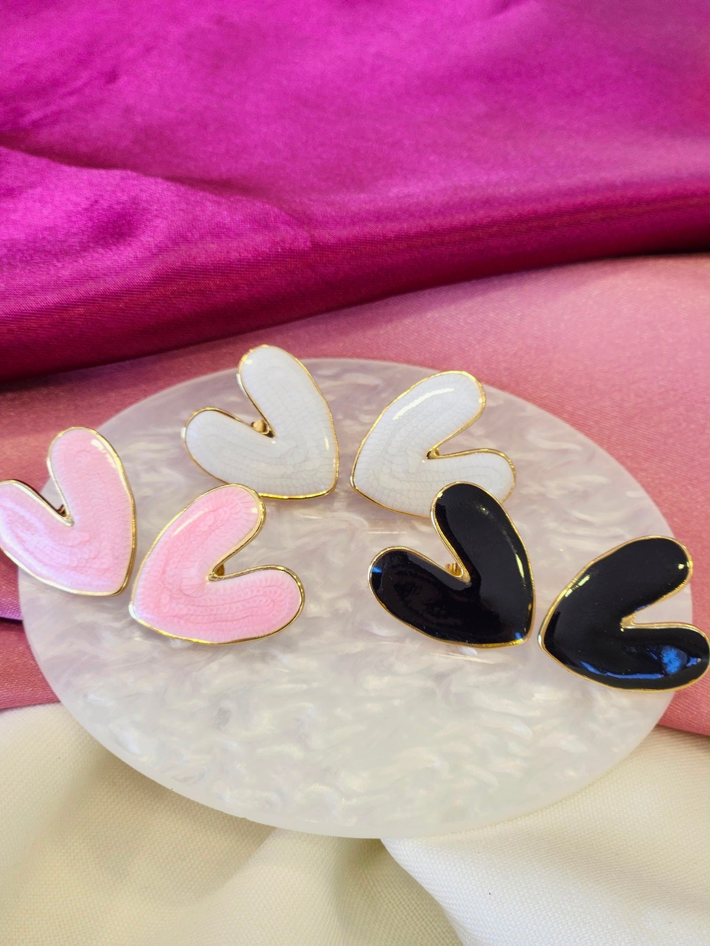 Aretes corazon centro marcado