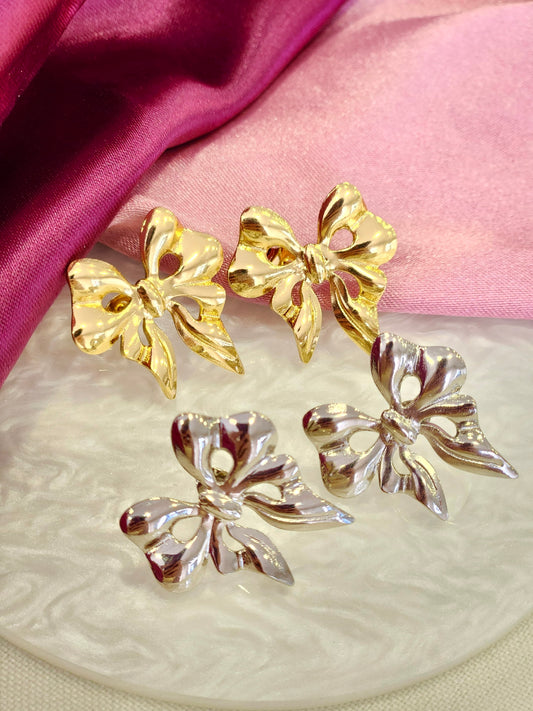 Aretes moño ondulado