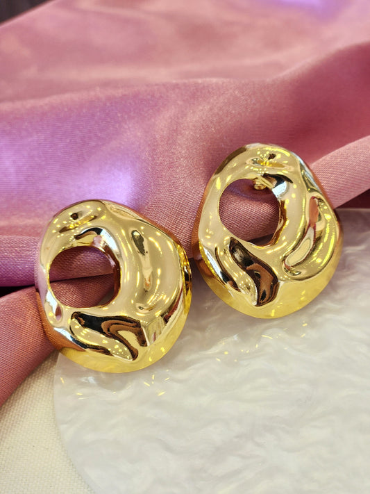 Aretes ovalados relieves huecos