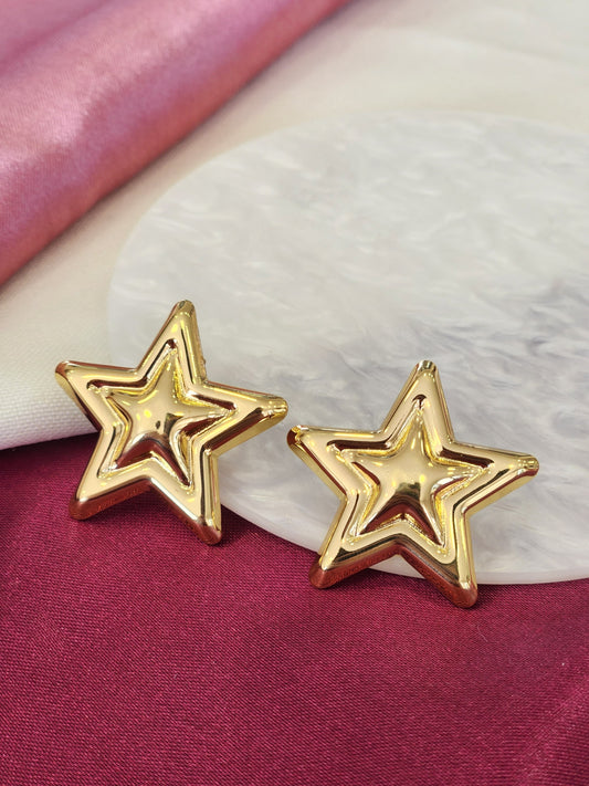 Aretes dorados estrella interna #K46