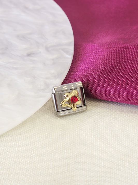 Charm flor punto zirconia rojo