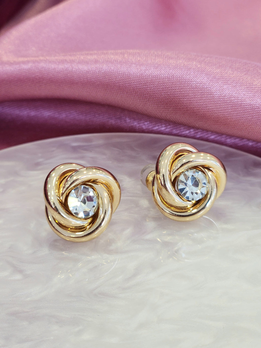 Aretes circulares entrelazados zirconia