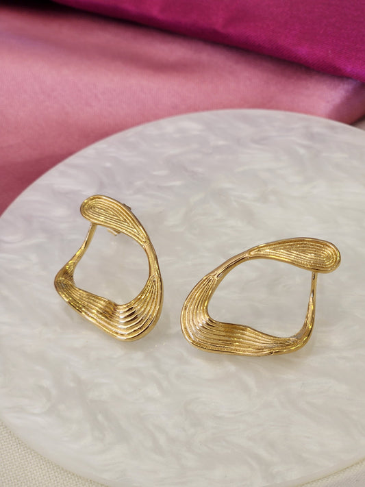Aretes aretes ovalo torcido lineas #J24