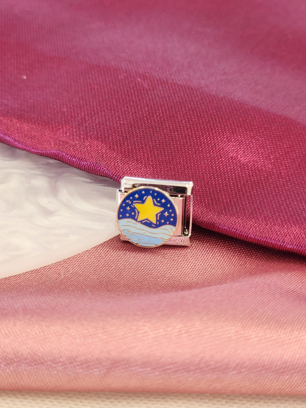 Charm estrellar mar plateado
