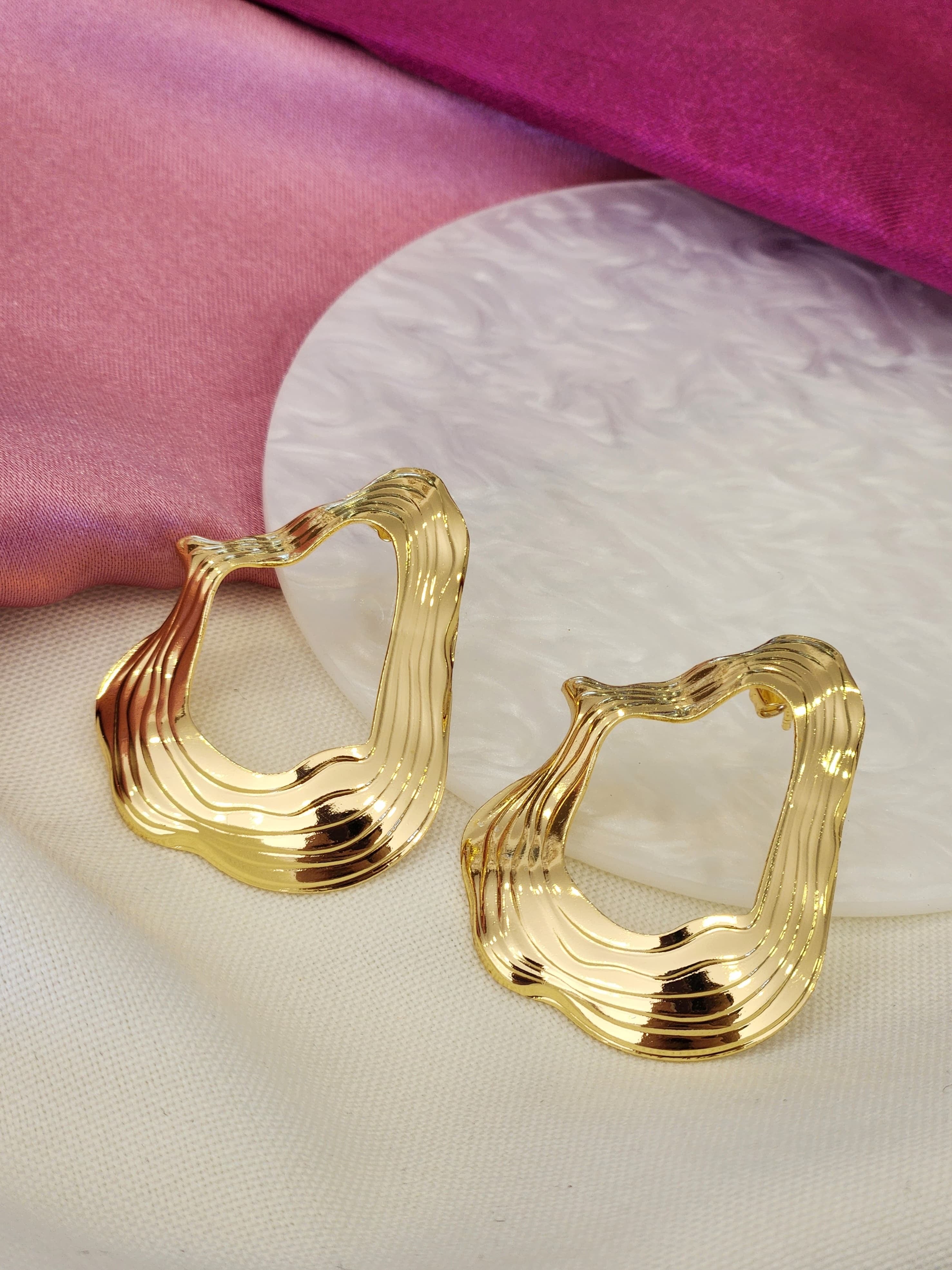 Aretes ovalo irregular lineas #K49