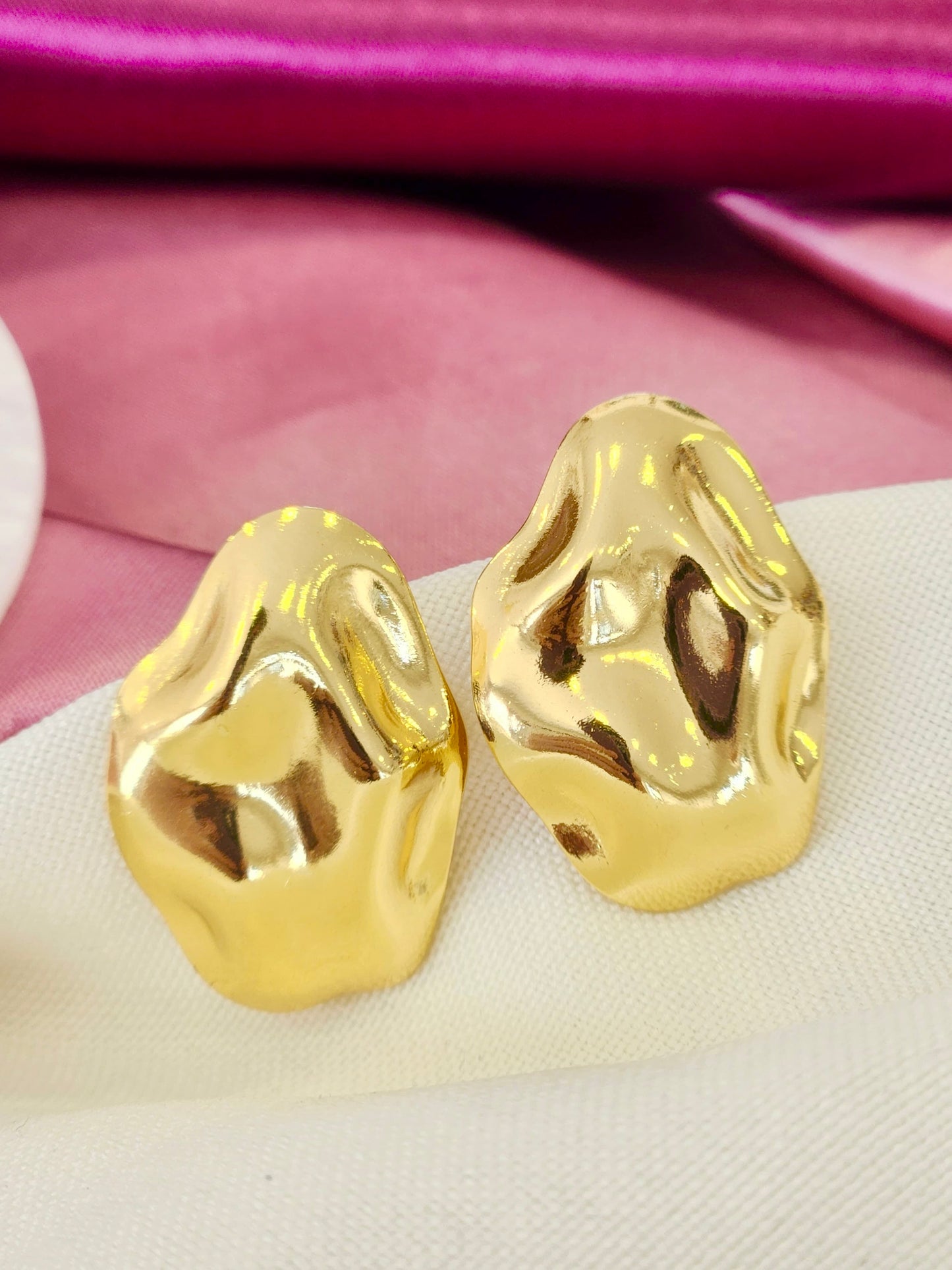 Aretes ovalado martillado irregular