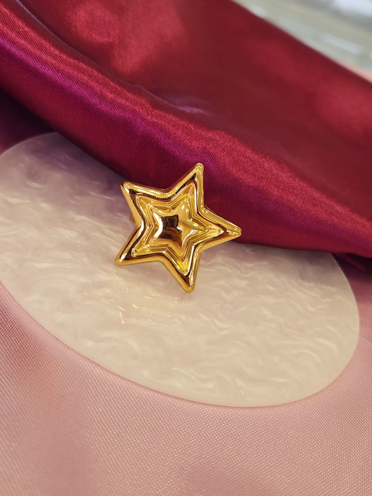 Anillo estrella dorada