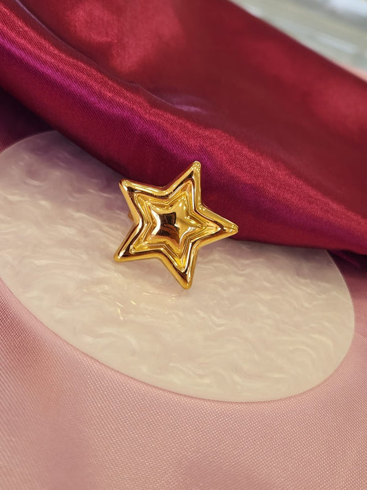 Anillo estrella dorada