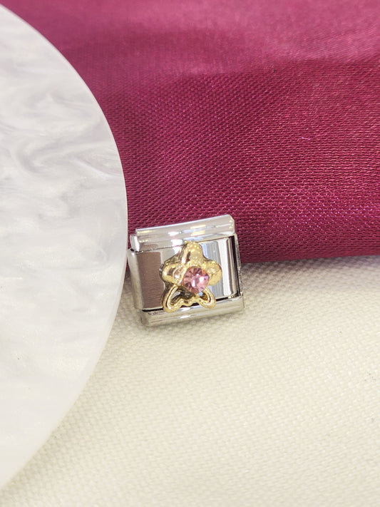 Charm flor punto zirconia rosa