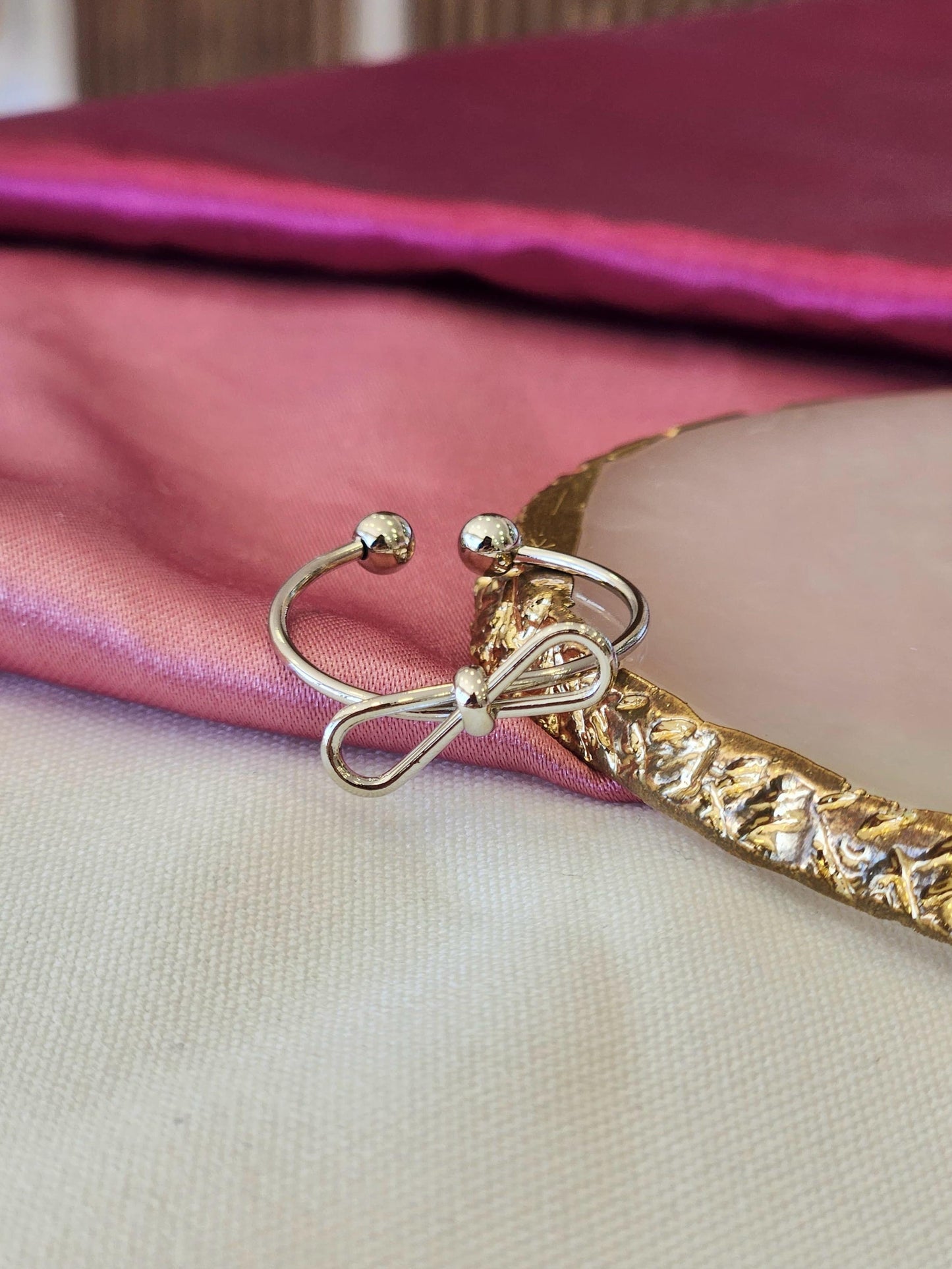 Pulsera y anillo moño plateado #42