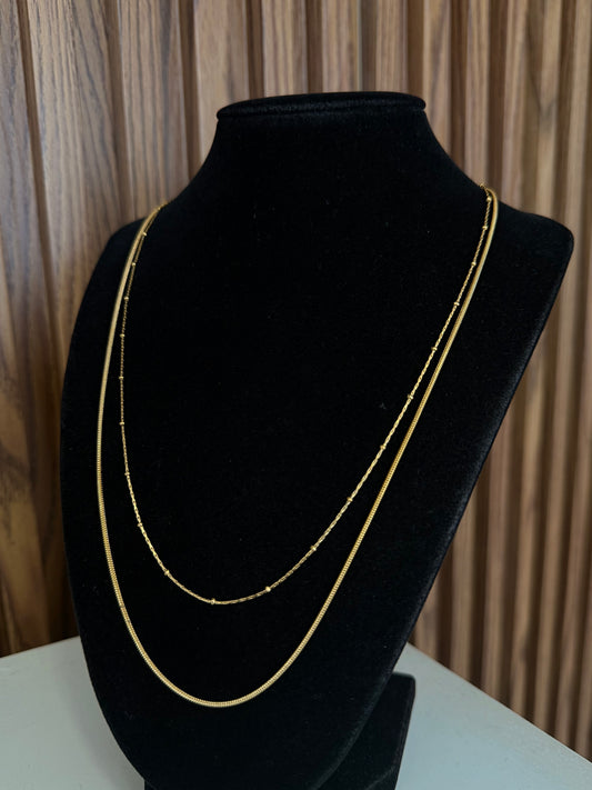 Collar doble bolitas dorado