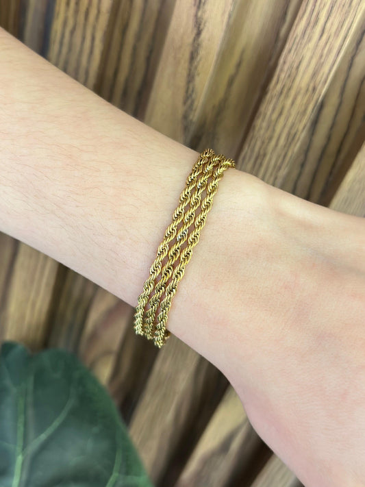 Pulsera triple torsal dorada #28