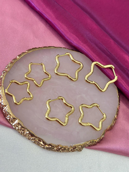 Aretes set estrella dorado simetrica #189
