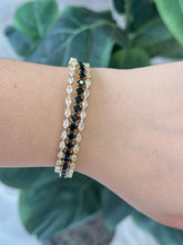 Cargar imagen en el visor de la galería, Pulsera dorada triple zirconia negro/cristal #C140

