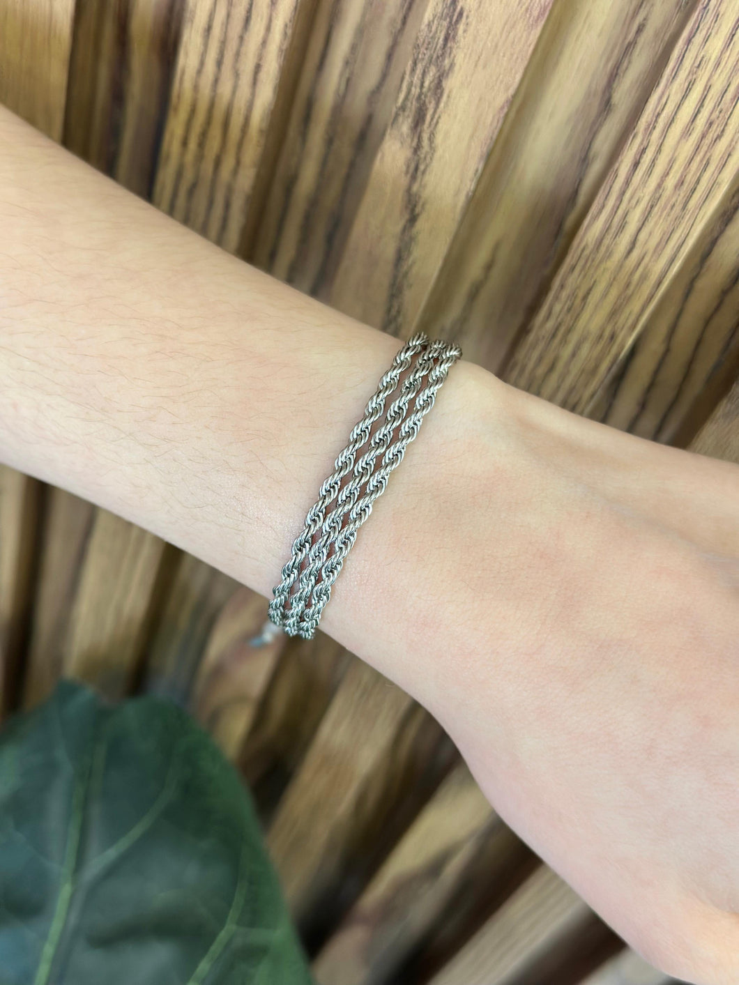 Pulsera triple torsal plateada