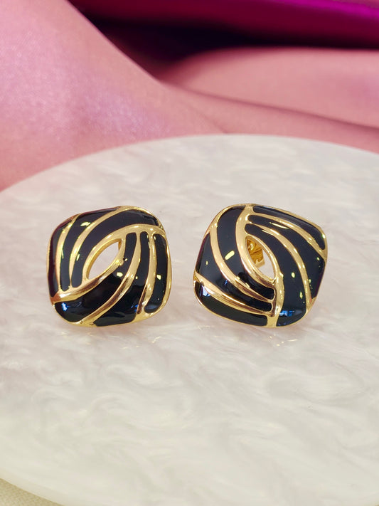 Aretes negro ovalo centro