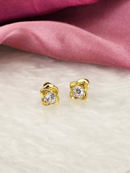 Aretes mini flor punto zirconia #104B